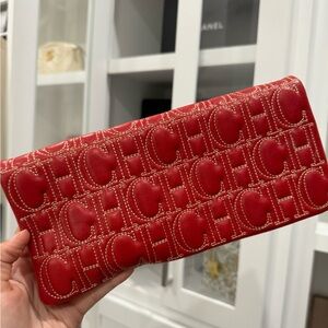 Carolina Herrera CH monogram red clutch